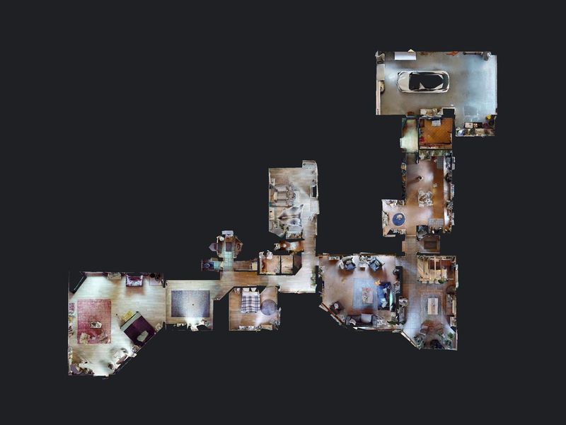 An overhead 3D scan or floor plan layout showing the spatial configuration and room arrangement of the property.