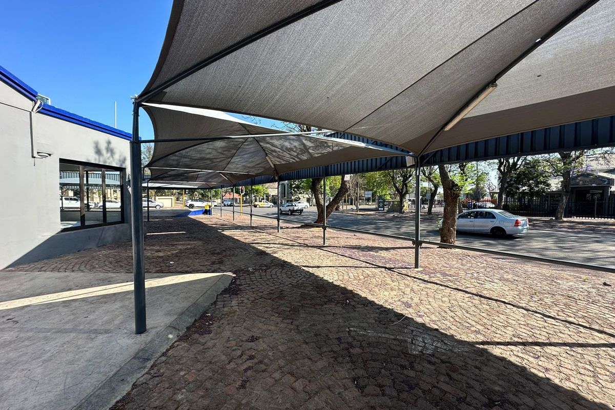 Prime Commercial Investment Opportunity: Four Retail Spaces on a bustling street! - Photo 3