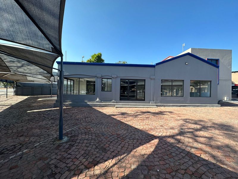 Prime Commercial Investment Opportunity: Four Retail Spaces on a bustling street! - Photo 2