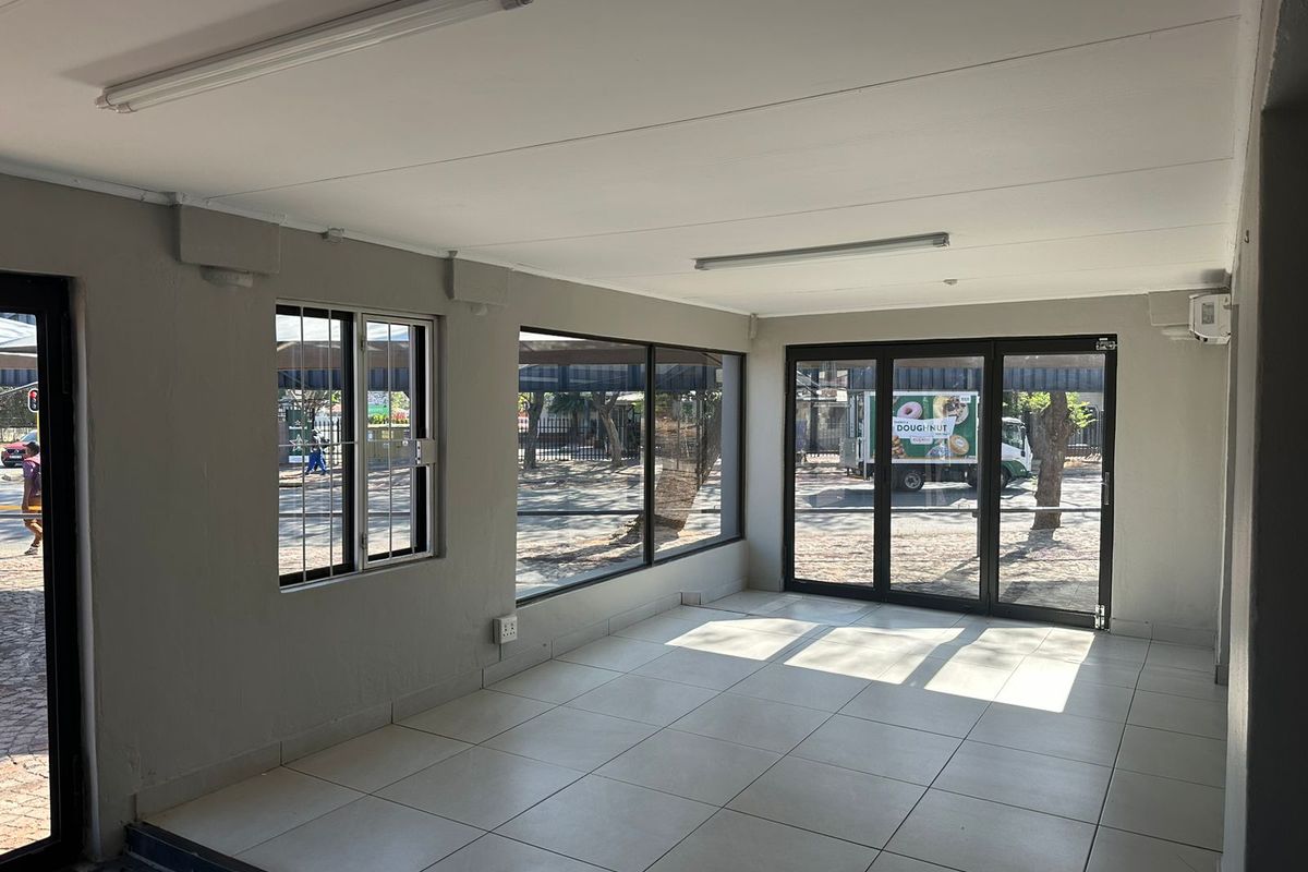 Prime Commercial Investment Opportunity: Four Retail Spaces on a bustling street! - Photo 5