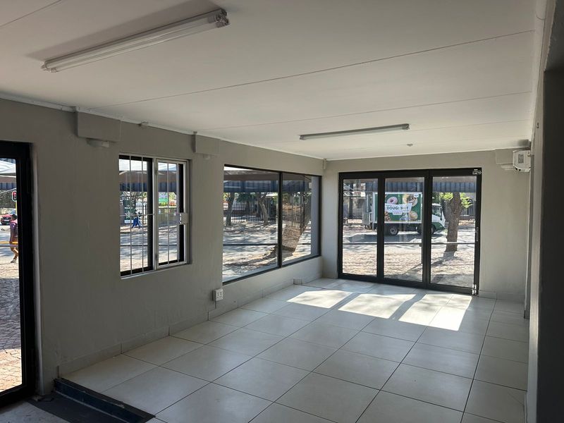 Prime Commercial Investment Opportunity: Four Retail Spaces on a bustling street! - Photo 5