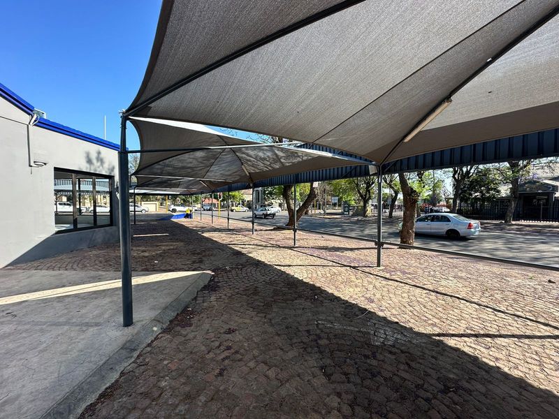 Prime Commercial Investment Opportunity: Four Retail Spaces on a bustling street! - Photo 3