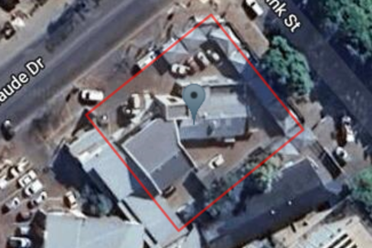 Aerial view of the property corner lot situated at the intersection of Brink Street and Claude Drive.