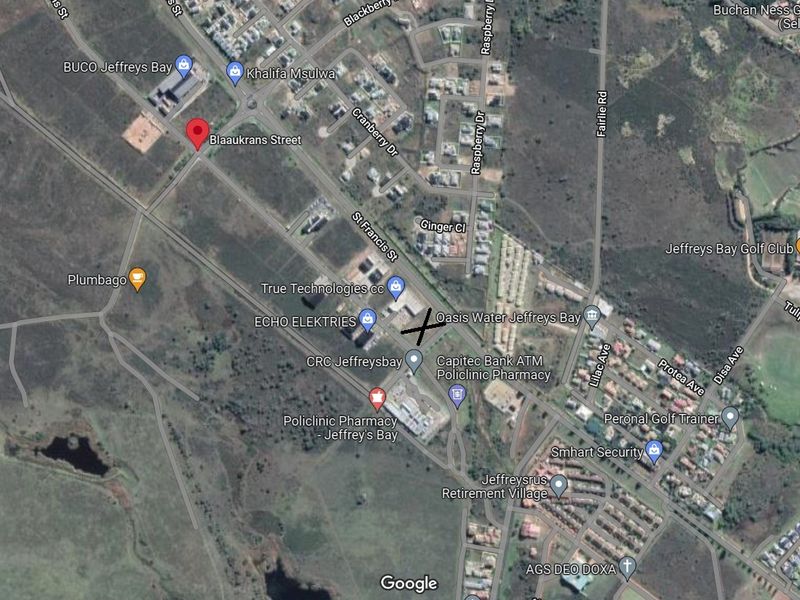An aerial satellite view of the commercial land area in Jeffreys Bay, showing surrounding infrastructure and street access.