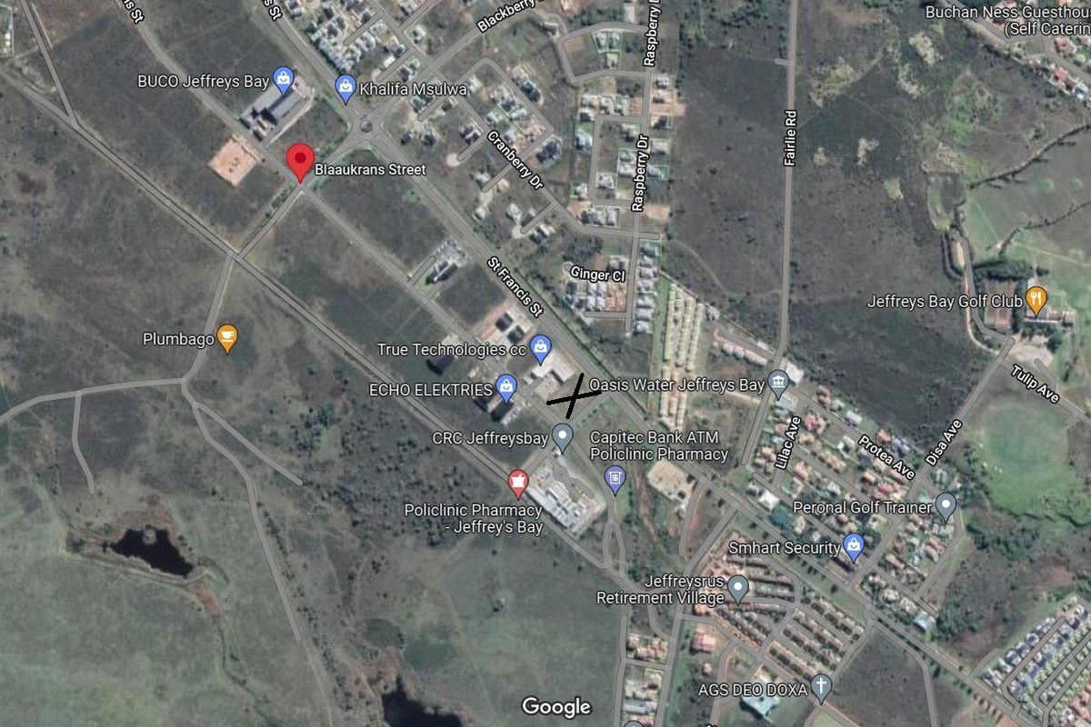 An aerial satellite view of the commercial land area in Jeffreys Bay, showing surrounding infrastructure and street access.