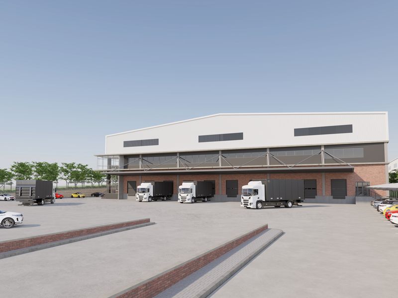 A modern industrial warehouse facility featuring multiple loading bays, a spacious paved yard, and dedicated covered parking areas.