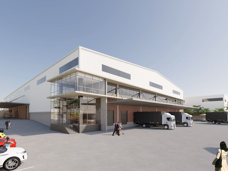 Modern industrial warehouse facility featuring a glass-fronted office section, multiple loading docks, and extensive concrete hardstand area for logistics operations.