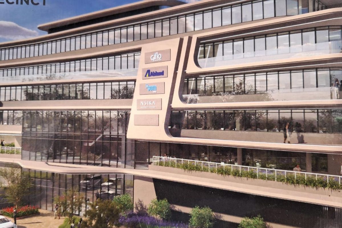 A modern multi-story office building featuring contemporary architectural design, glass curtain walls, and integrated corporate signage.