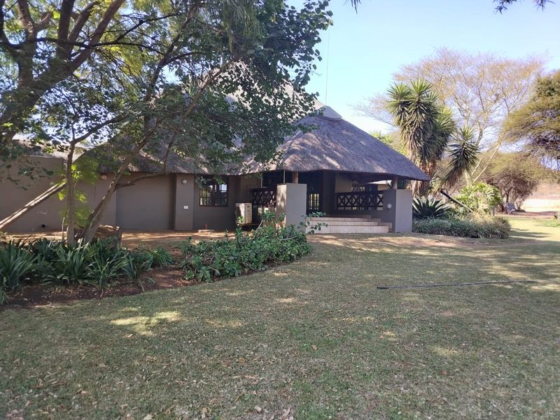 Scenic Retreat on the banks of the Crocodile River - Exclusive Lodge & Caravan Park for Sale - Photo 5
