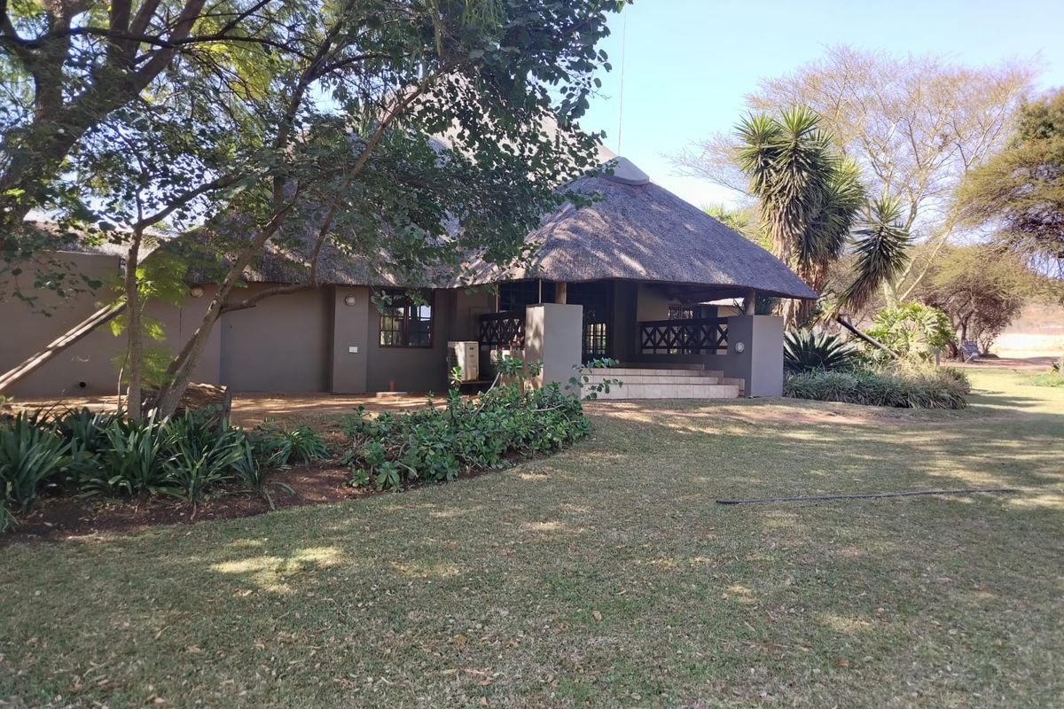 Scenic Retreat on the banks of the Crocodile River - Exclusive Lodge & Caravan Park for Sale - Photo 5