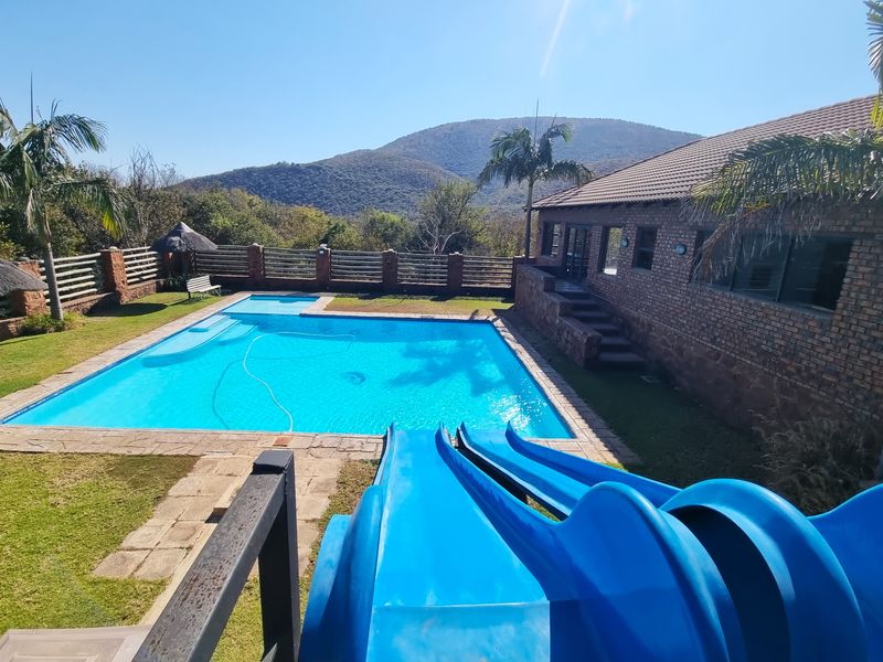 Scenic Retreat on the banks of the Crocodile River - Exclusive Lodge & Caravan Park for Sale - Photo 4