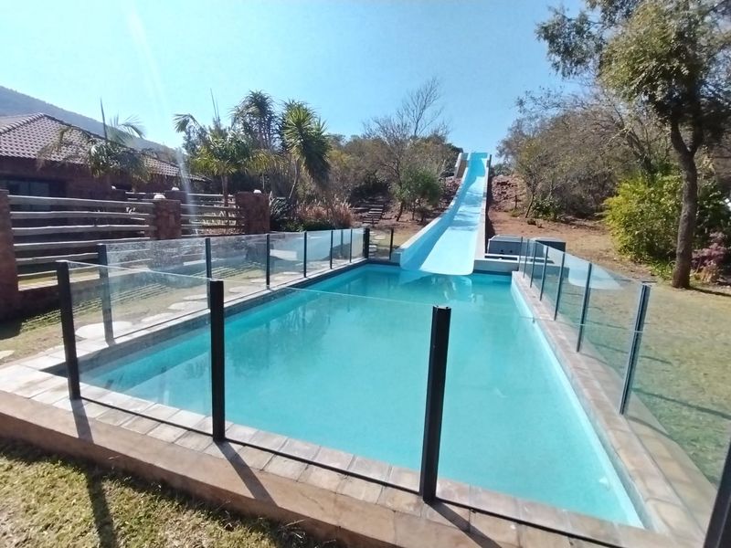Scenic Retreat on the banks of the Crocodile River - Exclusive Lodge & Caravan Park for Sale - Photo 1