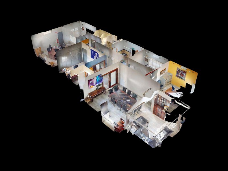 A 3D digital floor plan model showing the layout and spatial configuration of the office suite.