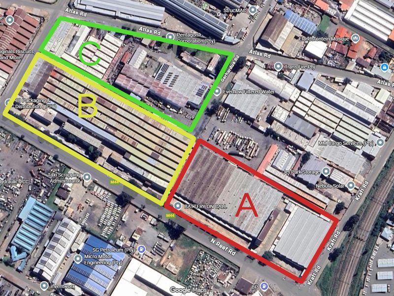 Aerial view of an industrial property complex featuring three distinct warehouse sections labeled A, B, and C with extensive roof coverage.