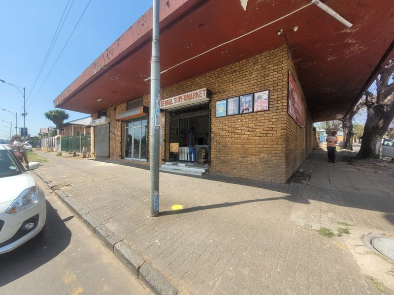 Versatile Commercial Property with Dual Stores and On-Site Accommodation - Photo 2