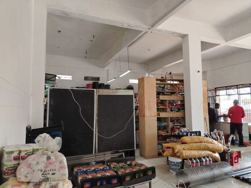 Versatile Commercial Property with Dual Stores and On-Site Accommodation - Photo 6