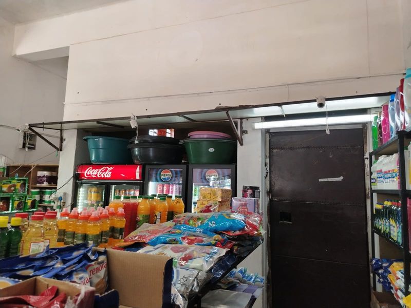 Versatile Commercial Property with Dual Stores and On-Site Accommodation - Photo 4