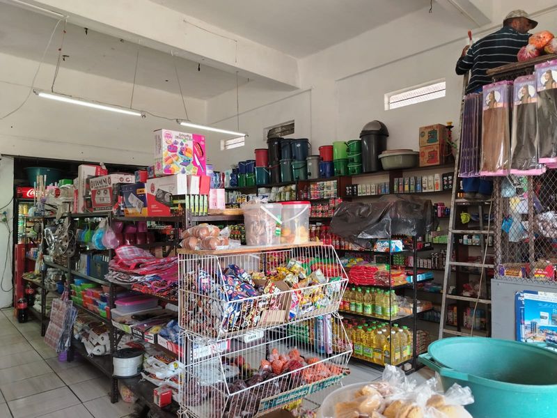 Versatile Commercial Property with Dual Stores and On-Site Accommodation - Photo 5