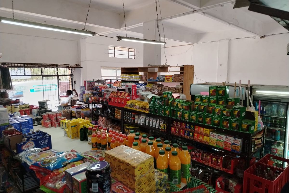 Versatile Commercial Property with Dual Stores and On-Site Accommodation - Photo 3