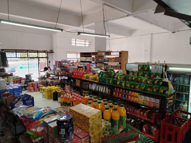 Versatile Commercial Property with Dual Stores and On-Site Accommodation - Photo 3