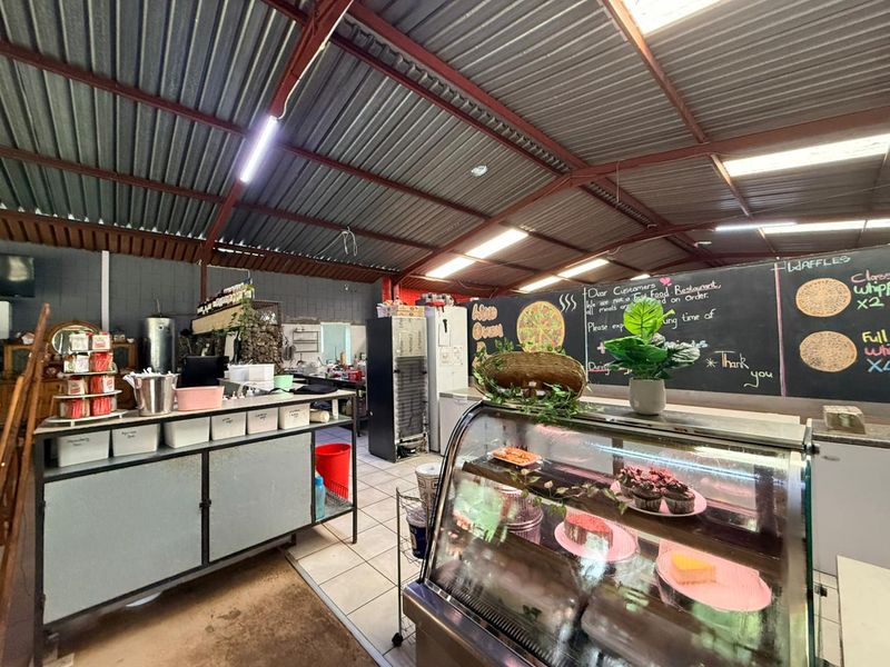 Grow Your Dream: Vibrant Flower-Filled Restaurant Ready for New Ownership - Photo 6