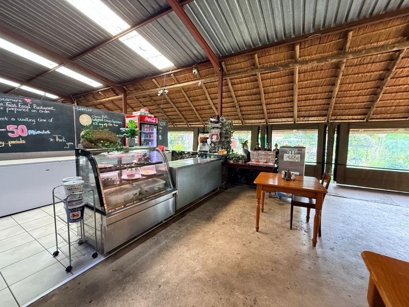 Grow Your Dream: Vibrant Flower-Filled Restaurant Ready for New Ownership - Photo 5