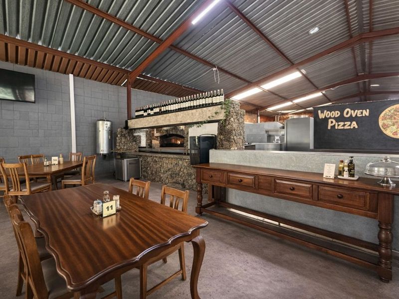 Grow Your Dream: Vibrant Flower-Filled Restaurant Ready for New Ownership - Photo 2