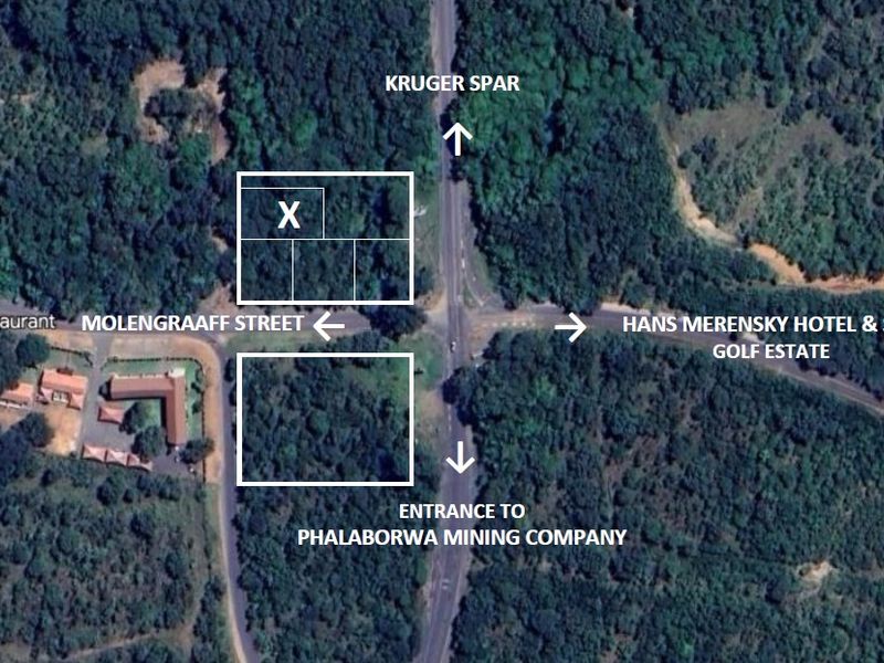 Aerial view of vacant commercial land parcels located near key local landmarks and road infrastructure.