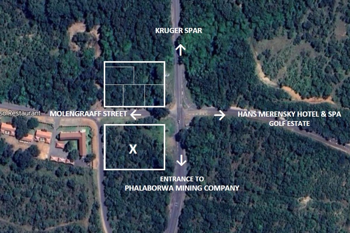 Aerial view of vacant commercial land parcels located near key local landmarks and major road access points.