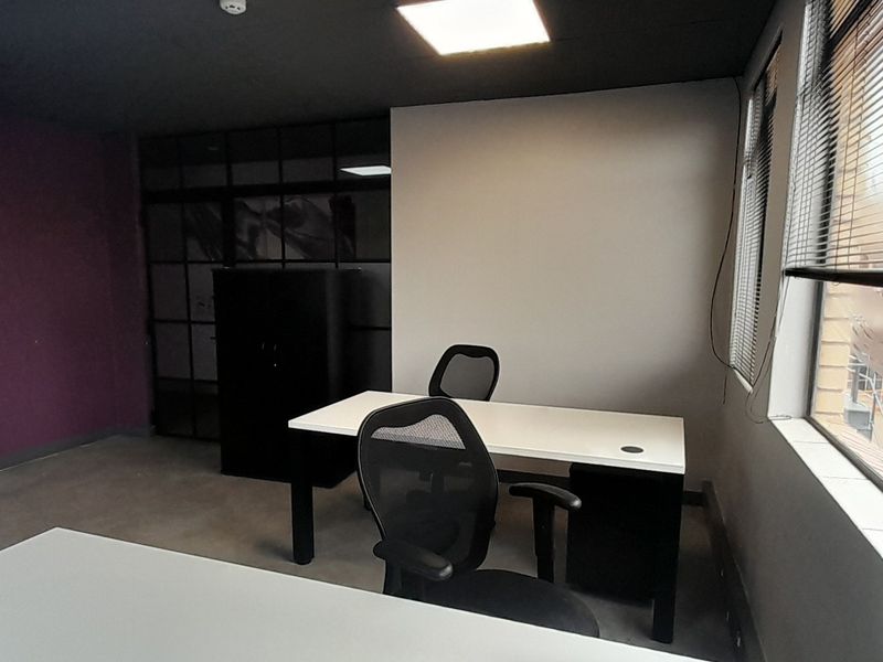 Professionally Furnished Office Suite in a Premium Business Location - Photo 7