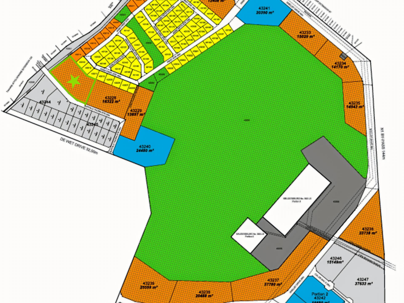 A detailed site layout plan showing various commercial land parcels, road access, and designated zones for the property development.