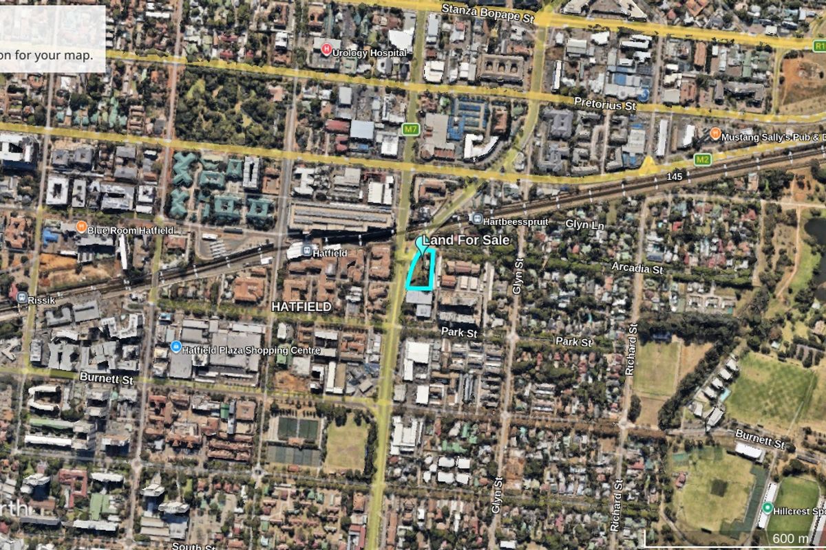 Aerial view of a vacant commercial land plot located in the Hatfield area, highlighting its position within the surrounding urban infrastructure and road network.