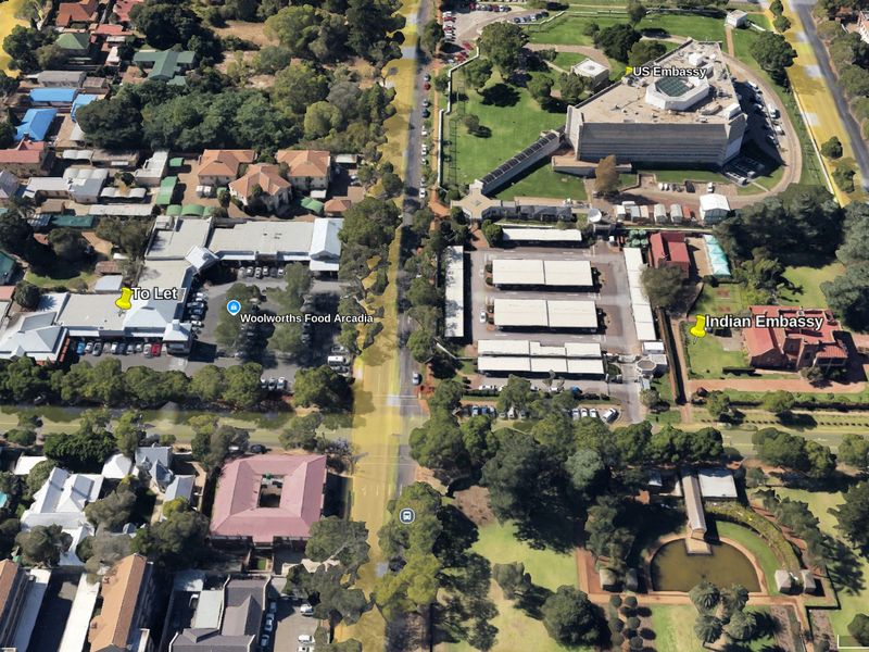 Aerial view of the Arcadia area showing commercial retail space, parking facilities, and surrounding urban infrastructure.