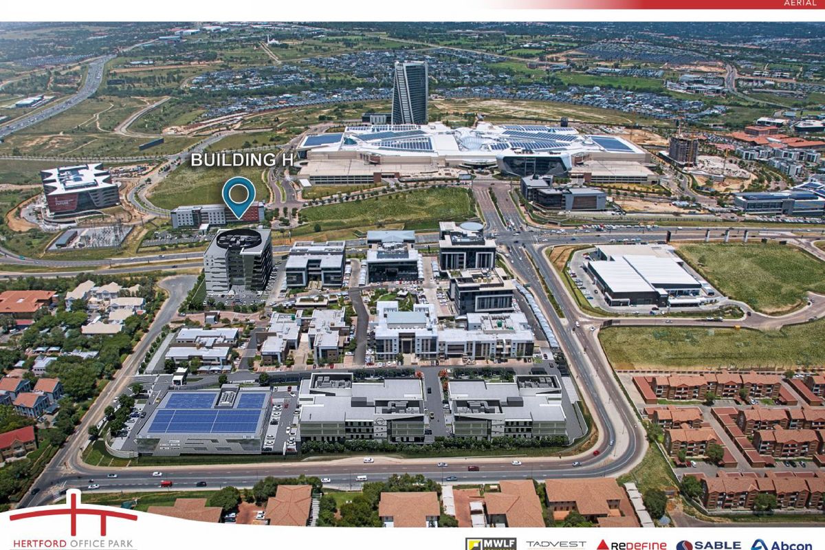 Aerial view of Hertford Office Park, showcasing the modern office complex layout, surrounding infrastructure, and proximity to major commercial developments.