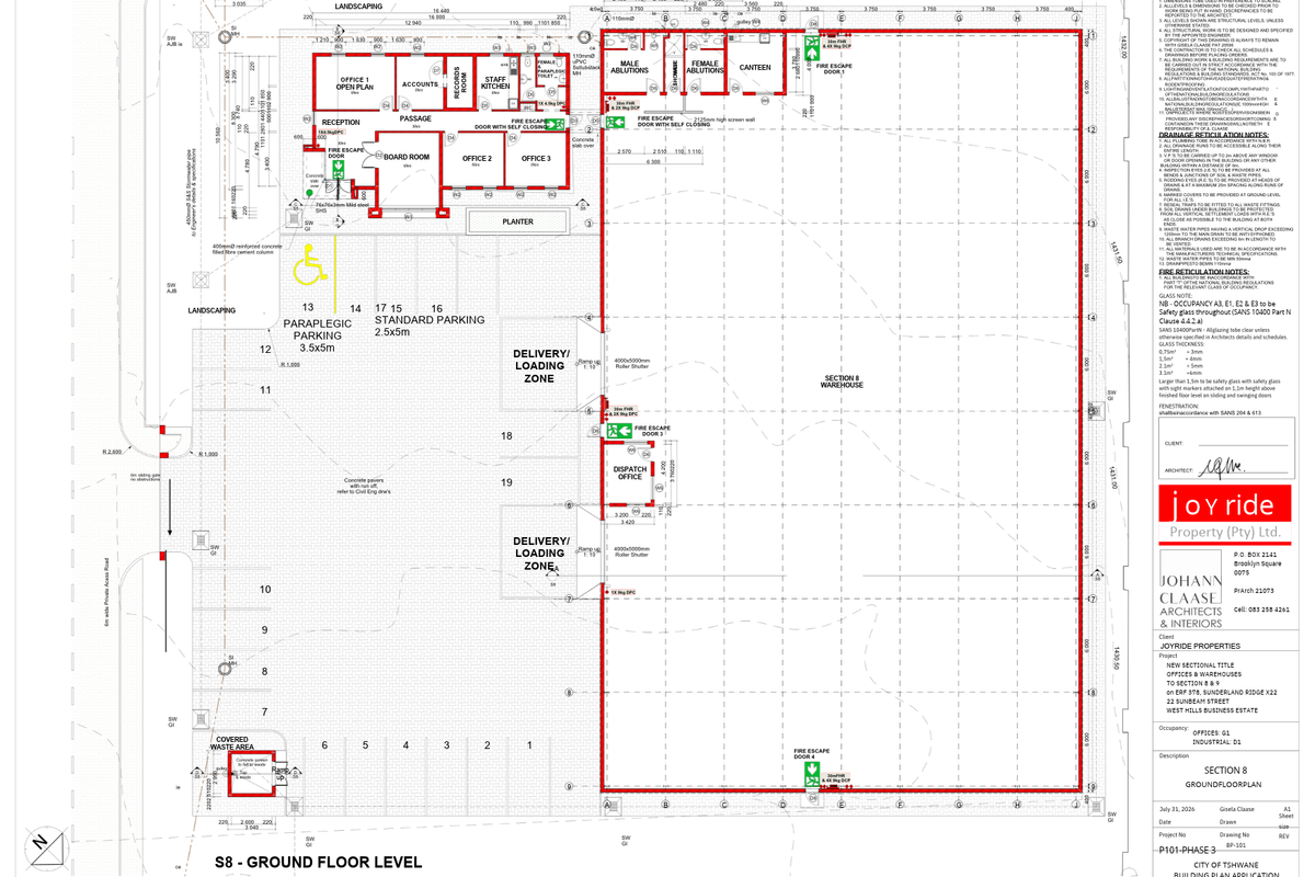 Architectural ground floor plan for an industrial warehouse facility, detailing office layouts, loading zones, ablution blocks, and fire escape access points.