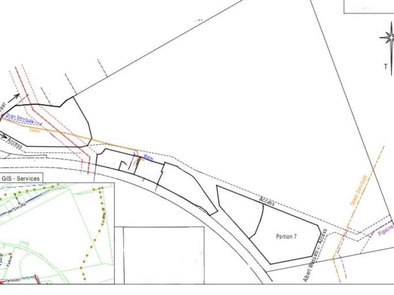 A detailed site plan showing property boundaries, access points, and utility servitudes for the industrial plot.