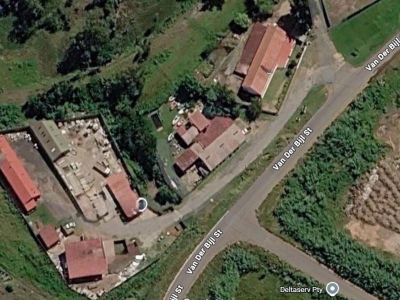 Aerial view of an industrial property featuring multiple sheds, a paved yard area, and direct access from Van Der Bijl Street.