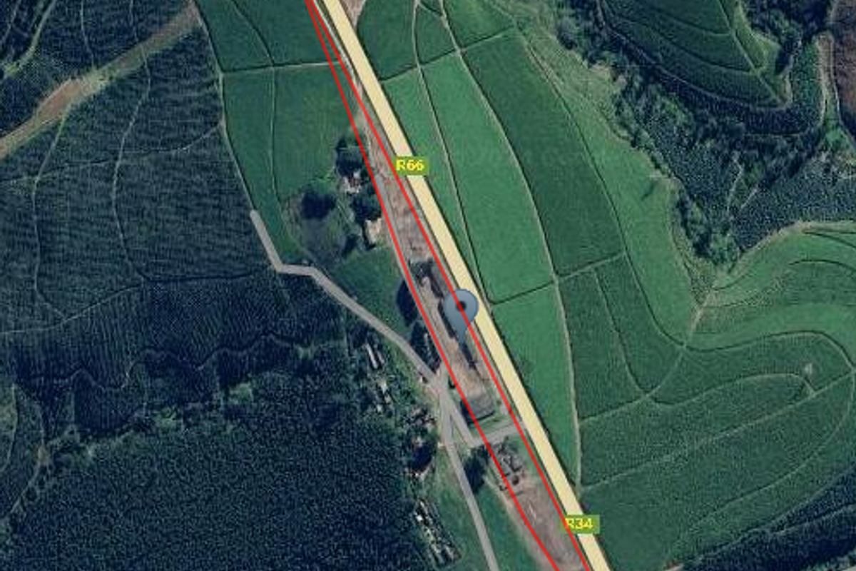 Aerial view of the industrial property site, highlighting its location and proximity to the R66 and R34 main roads.
