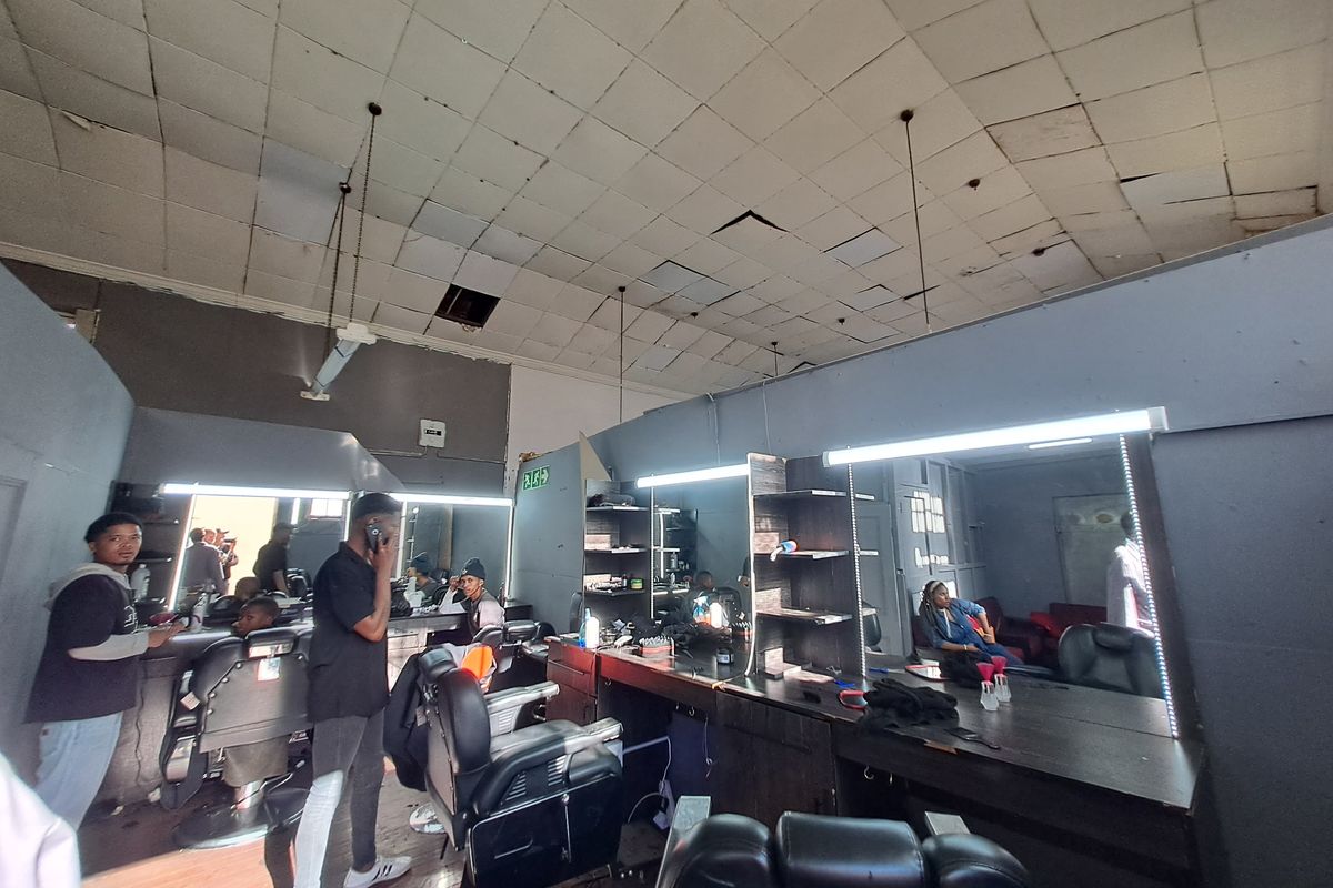 Prime Corner Commercial Property with Shops, Bedrooms, and Upper-Level Space - Photo 2