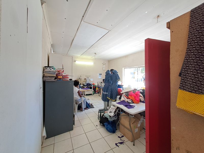 Former Hotel Turned Multi-Use Commercial Property with Shops and Rental Rooms - Photo 4
