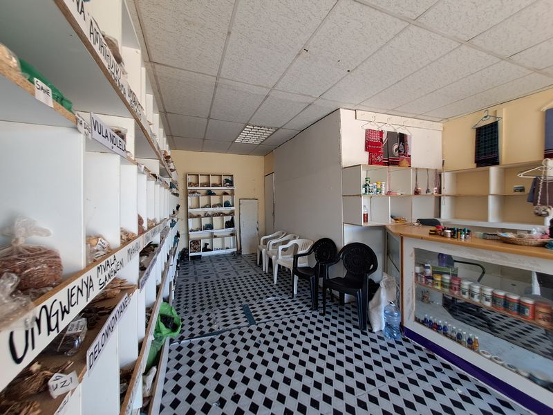Former Hotel Turned Multi-Use Commercial Property with Shops and Rental Rooms - Photo 8