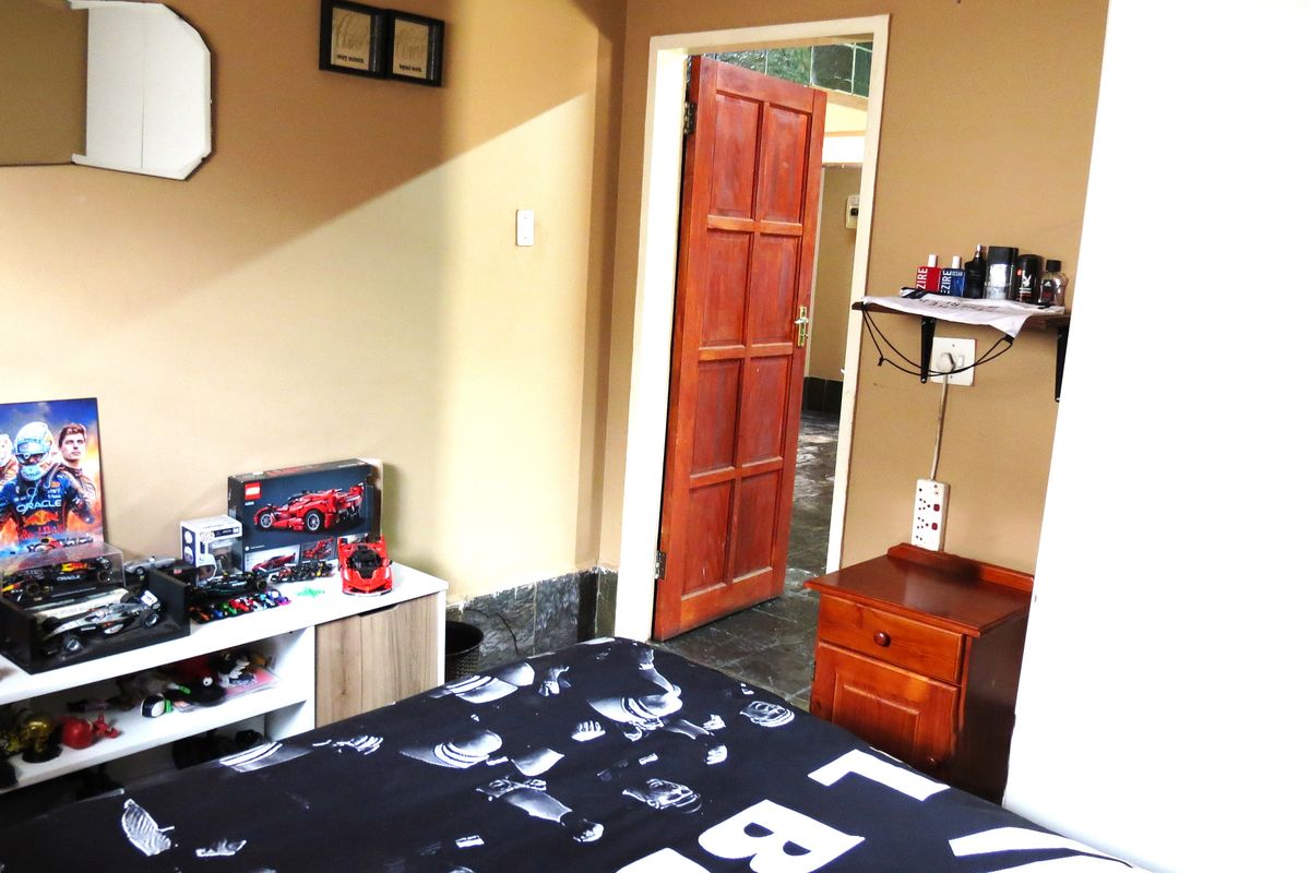 Charming 4-Bedroom Family Home with Income-Generating Flatlet - Photo 5