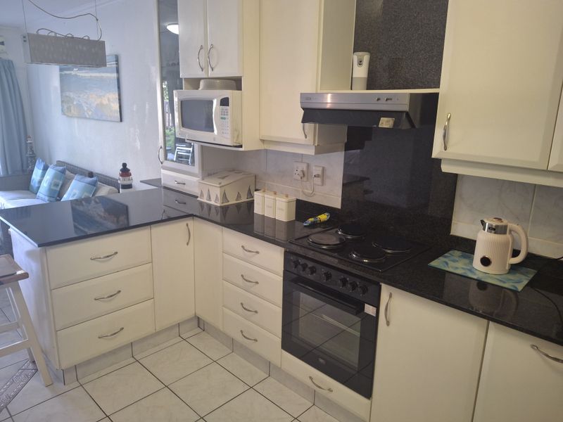 Beachfront Ground Floor Gem - Photo 4