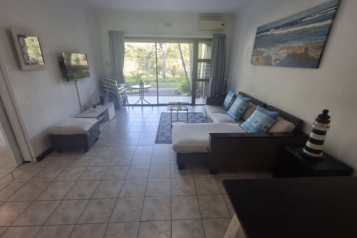 Beachfront Ground Floor Gem - Photo 5