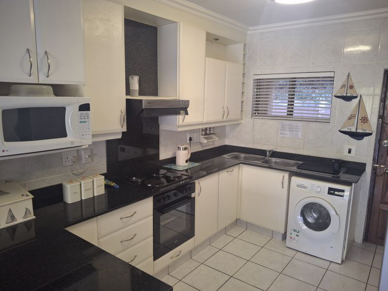 Beachfront Ground Floor Gem - Photo 3