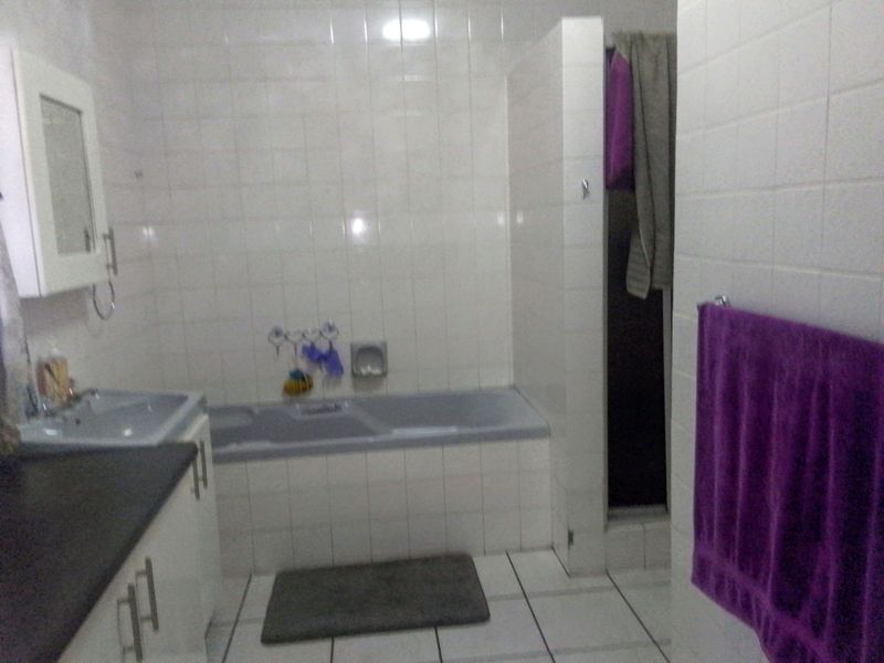 Charming 4-Bedroom Home with Spacious Yard and Extra Features - Photo 9