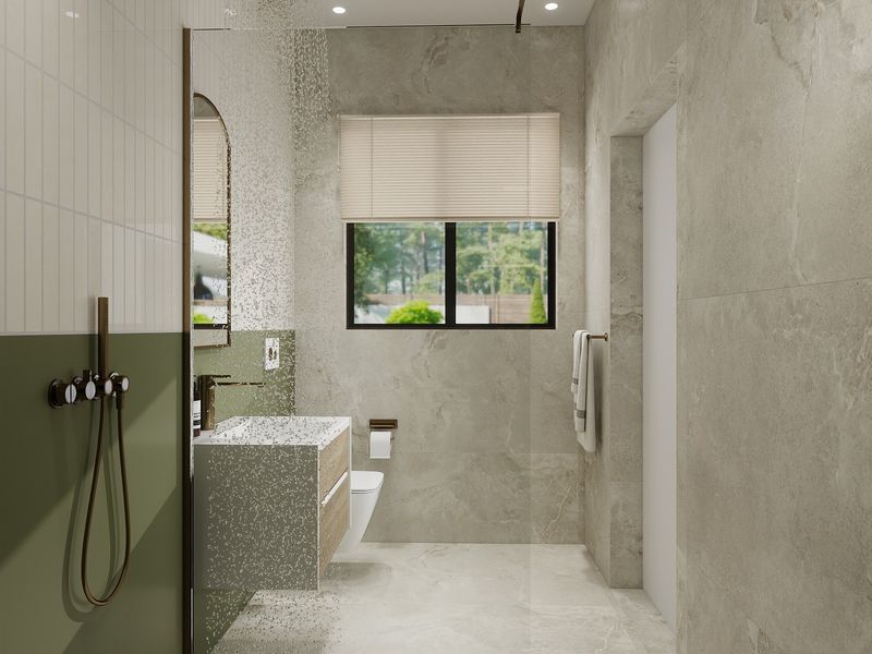 Modern bathroom featuring high-end stone-look tiling, a wall-mounted vanity, wall-hung toilet, and contemporary bronze-finish shower fixtures.