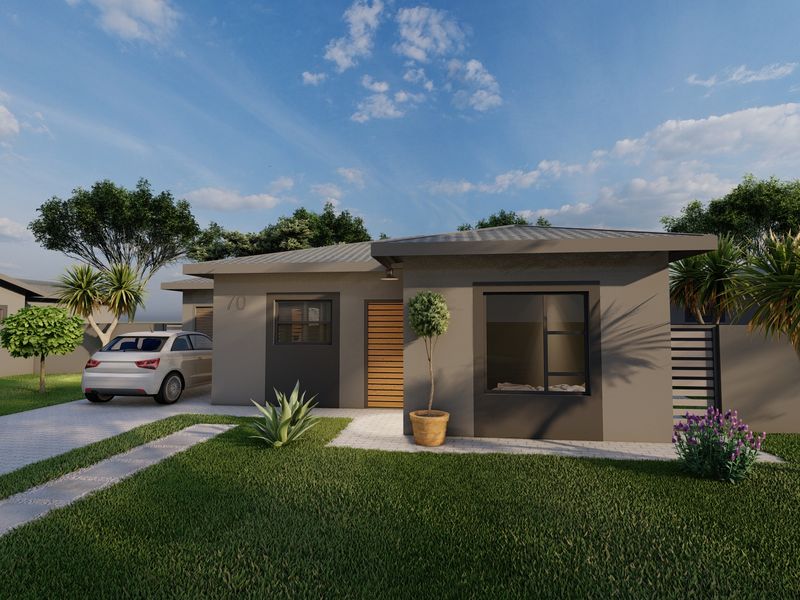 A modern single-story residential house featuring a paved driveway, neat lawn, and contemporary exterior finishes.
