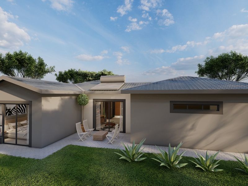 Rear view of a modern single-story house featuring a paved patio, sliding glass doors, and a well-maintained lawn.