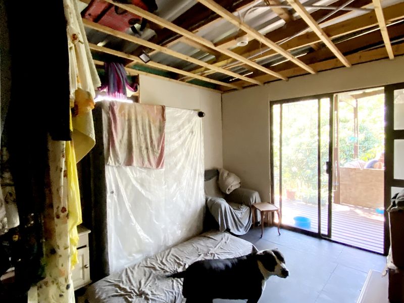 The Fixers Dream, 3 Bedroom Log Home with Expansive Yard and Endless Potential - Photo 10